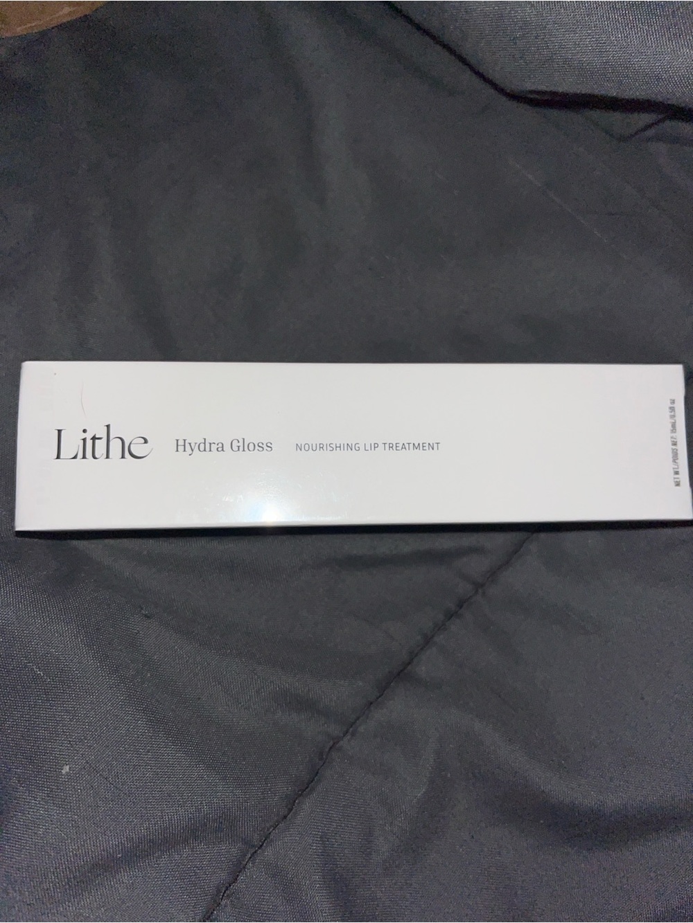 LITHE Hydra Gloss Peptides Nourishing Lip Treatment -beautiful pink color.